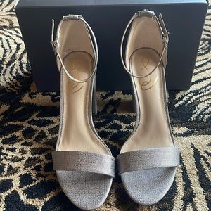 New Sam Edelman sandals in silver color. 4” heels.